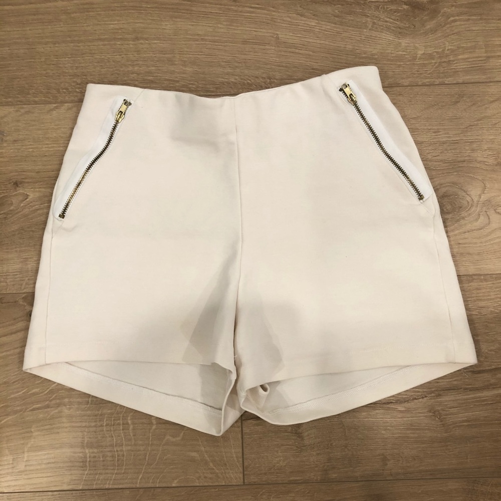 White/cream fabric shorts and stretchy band on top